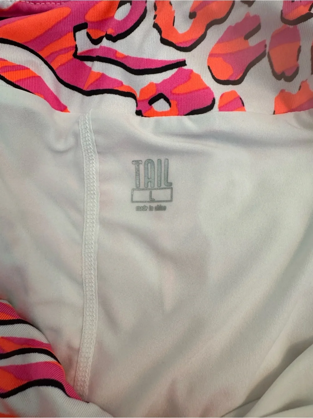 The Tail Activewear Gaia Zebra Swirl Pleated 18